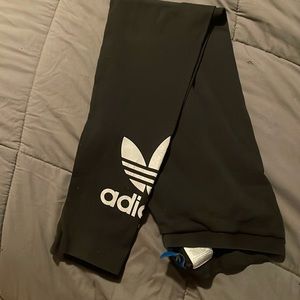 EUC Adidas black leggings w/ white symbol on the bottom of each legs